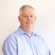 Headshot of Andrew Schulz.