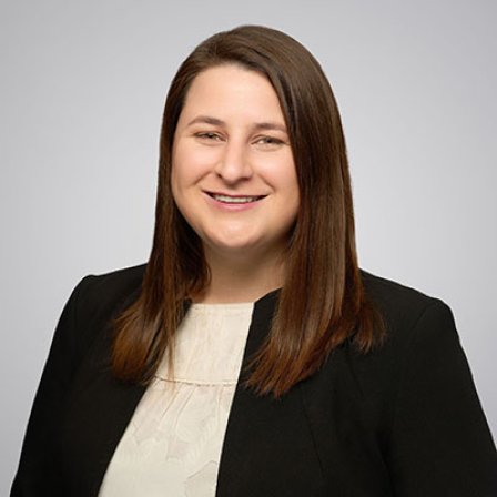 Headshot of a woman with brown hair