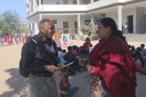 Arvind visiting an elementary school in India.