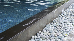 swimming pool with decorative stones
