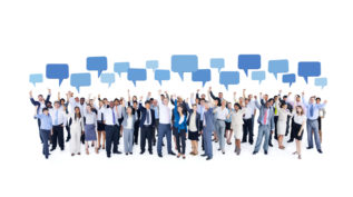 a group of business people with idea bubbles hovering above them