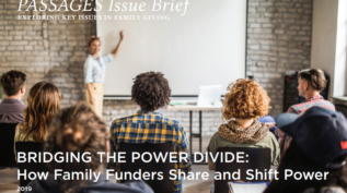 Cover of the Passages Issue Brief, Bridging the Power Divide, with a person teaching a few others in a room