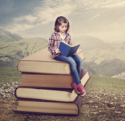 a girl reads a book while sitting on a stack of books