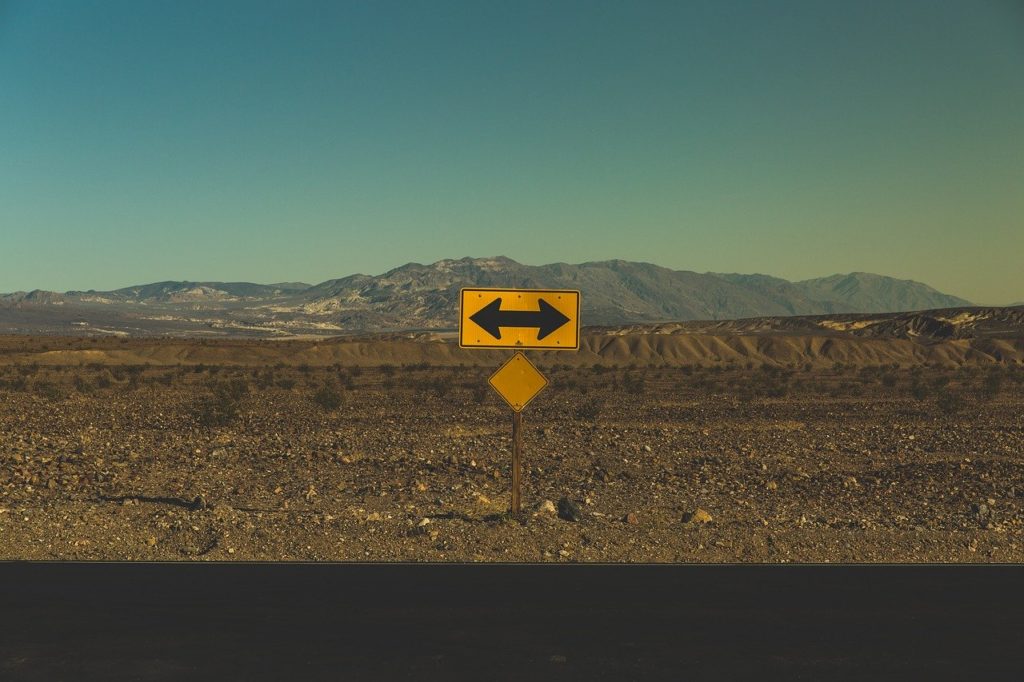 Arrow pointing both directions in desert