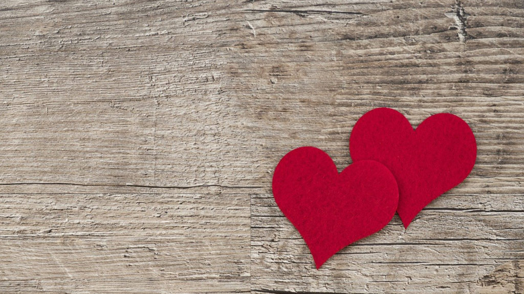 hearts on wooden table