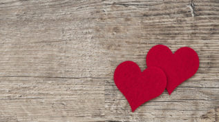 hearts on wooden table