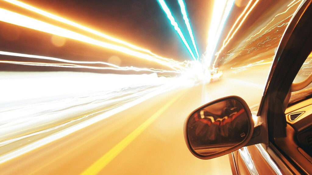 car accelerating through tunnel