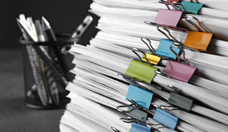 Stacks of paper binder clips