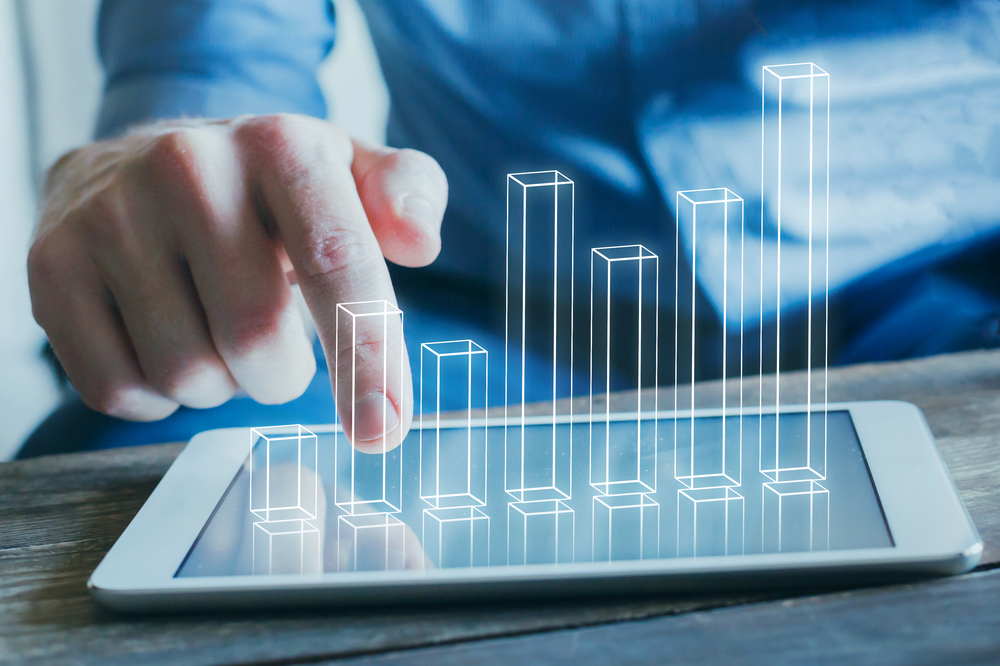 hand pointing to graph