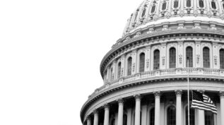 Black and white photo of the United States Capitol building