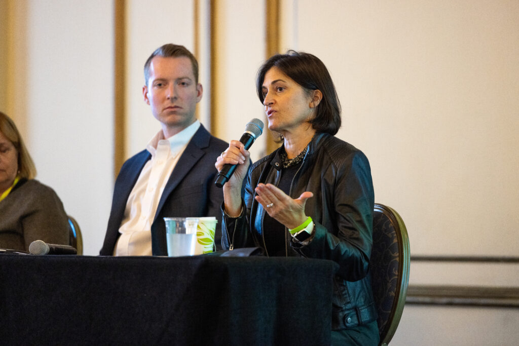 Sam Downes (left), Andrus Family Philanthropy Program Committee Member, and Kelly Nowlin (right), former Surdna Foundation trustee, speaking about partnering across generations at the 2022 National Forum on Family Philanthropy in San Francisco