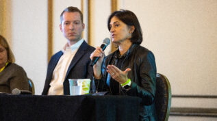 Sam Downes (left), Andrus Family Philanthropy Program Committee Member, and Kelly Nowlin (right), former Surdna Foundation trustee, speaking about partnering across generations at the 2022 National Forum on Family Philanthropy in San Francisco