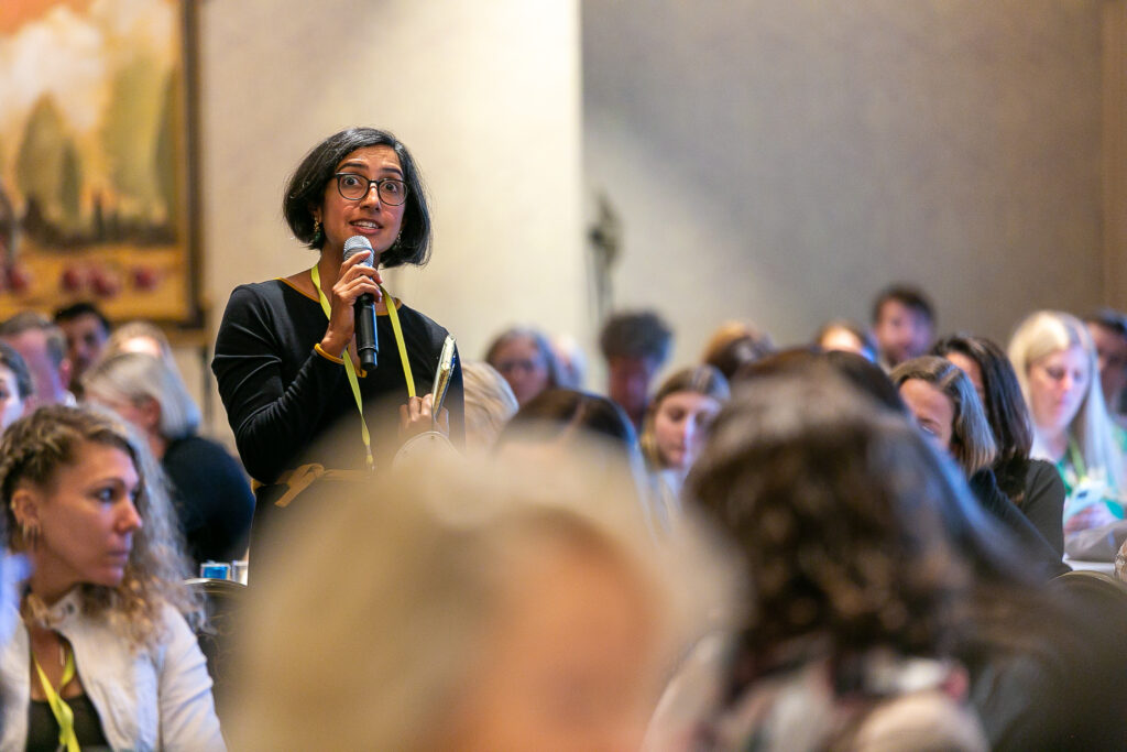 Attendee asking a question at the 2022 National Forum on Family Philanthropy in San Francisco.
