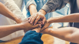 People taking part in a trust-based philanthropy exercise