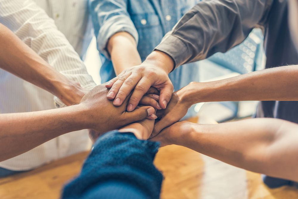 People taking part in a trust-based philanthropy exercise