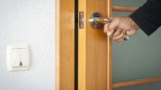 Person opening a door